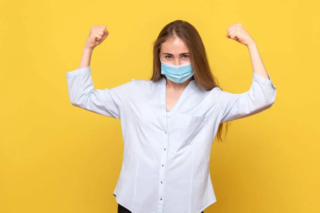 front view young female rejoicing mask scaled