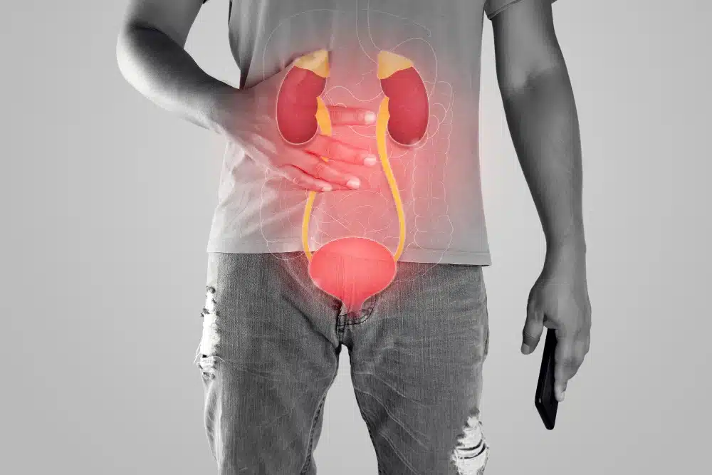 A urologist warmly reassuring a patient at German Medical Center, Dubai Healthcare City