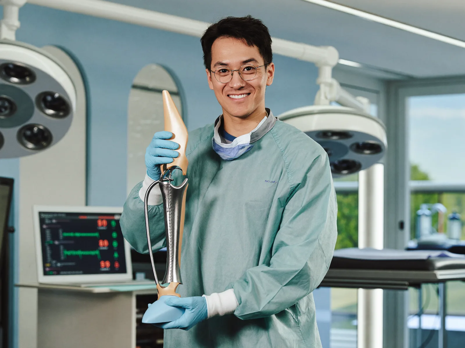 Orthopedic surgical team preparing for joint replacement surgery in a modern operating theatre