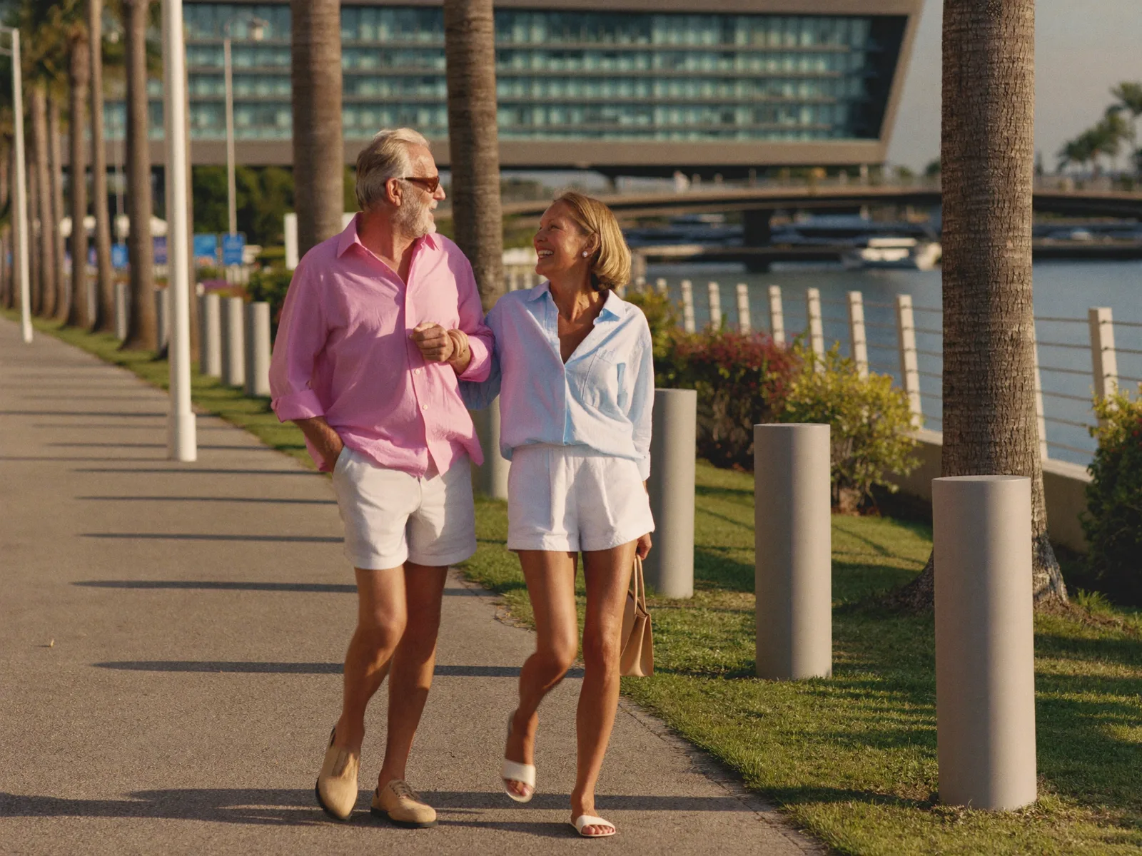 Active senior couple walking comfortably after osteoarthritis treatment in Dubai